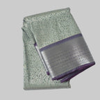 Rich white semi kanchipuram silk saree with lavender heavy border