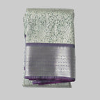 Rich white semi kanchipuram silk saree with lavender heavy border
