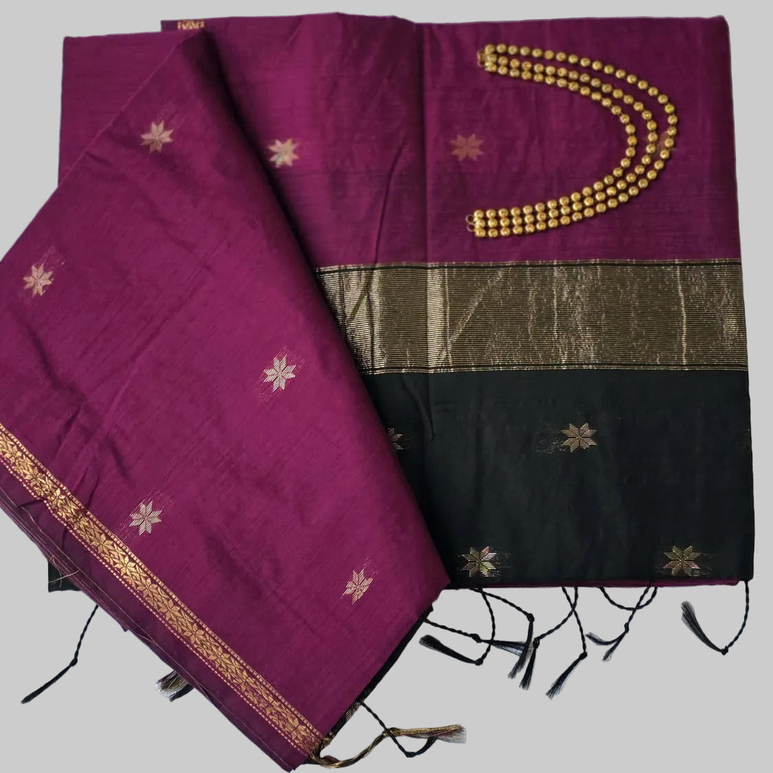 Onion pink cotton silk saree with black and golden border