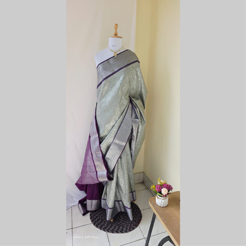 Rich white semi kanchipuram silk saree with lavender heavy border