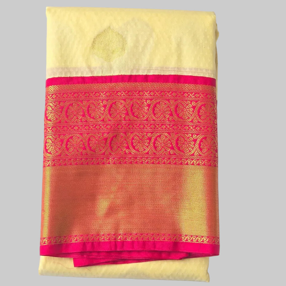 Off white with rich rani pink boarder semi kanchipuram saree
