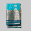 Sea blue butta semi kanchipuram silk with heavy dark green border