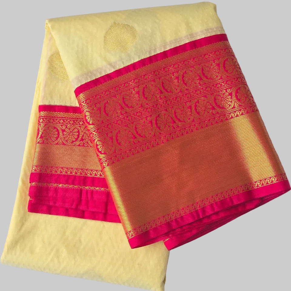 Off white with rich rani pink boarder semi kanchipuram saree