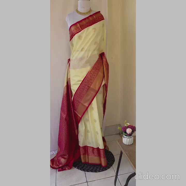 Off white with rich rani pink boarder semi kanchipuram saree
