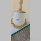 Sea blue butta semi kanchipuram silk with heavy dark green border