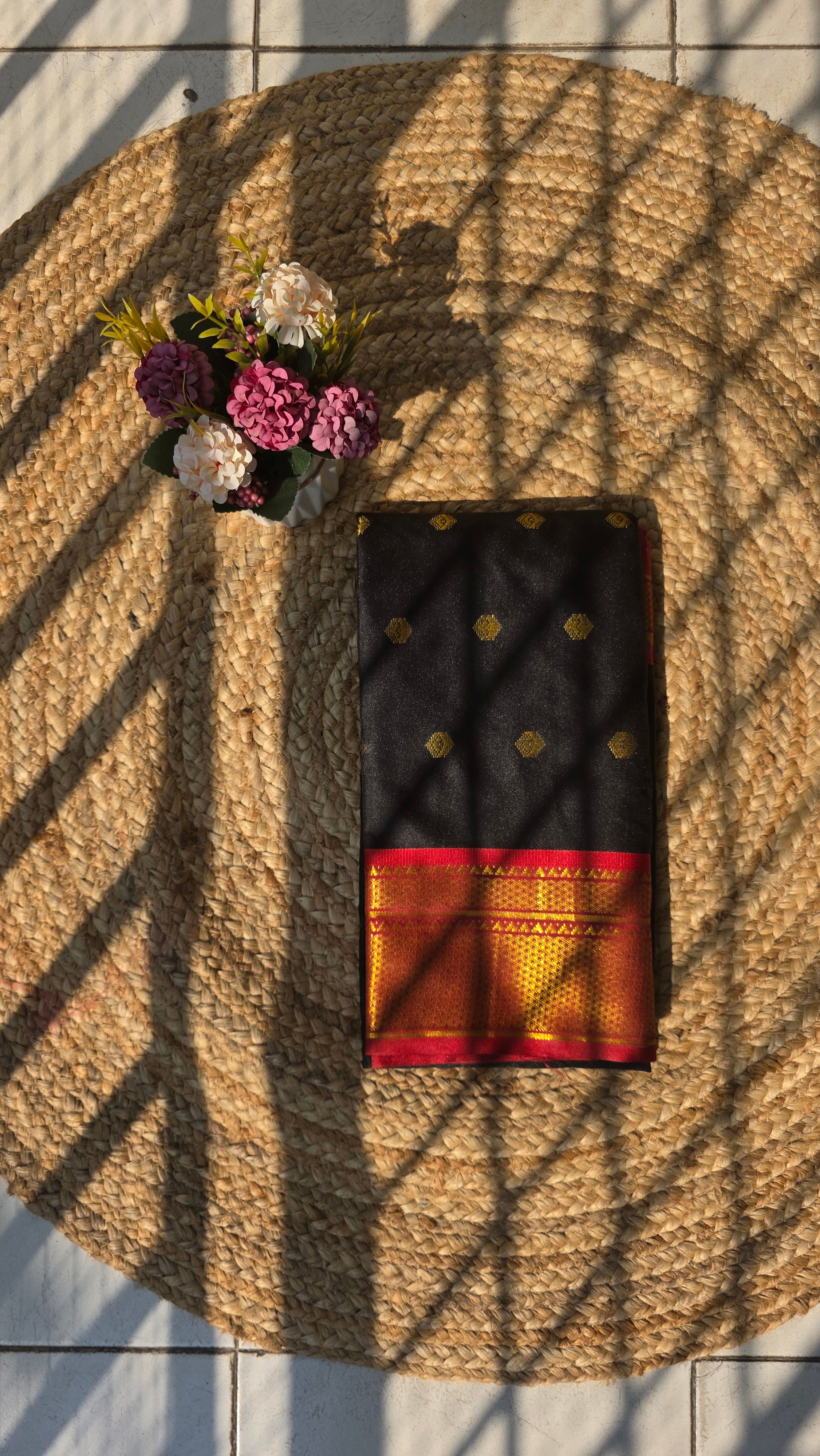 Black colour semi silk saree with red border