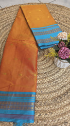Mango yellow coloured semi kanchipuram silk saree with ramar blue border
