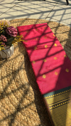 Rani pink colour semi silk saree with dark green border