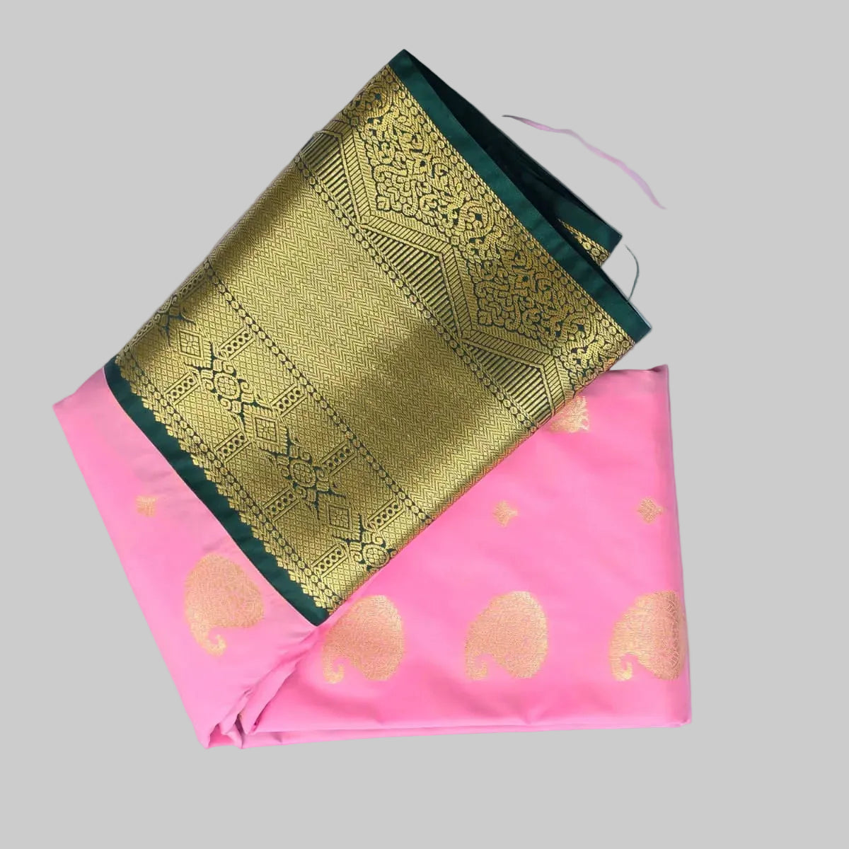 Light pink color with butta semi kanchipuram silk saree with dark green border