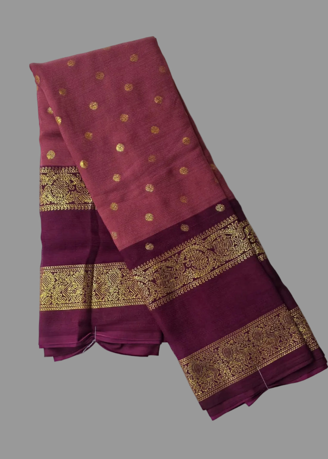 Onion pink colour foil printed saree with maroon border and buttas.