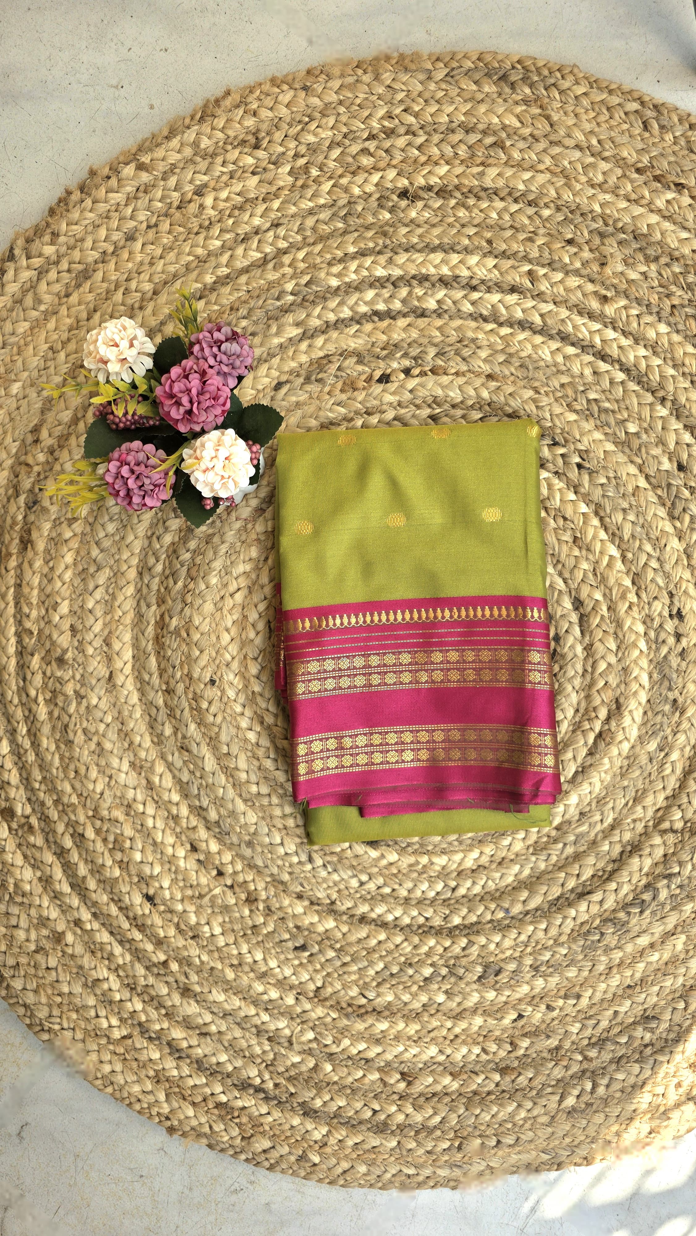 Parrot green colour semi silk saree with rani pink border