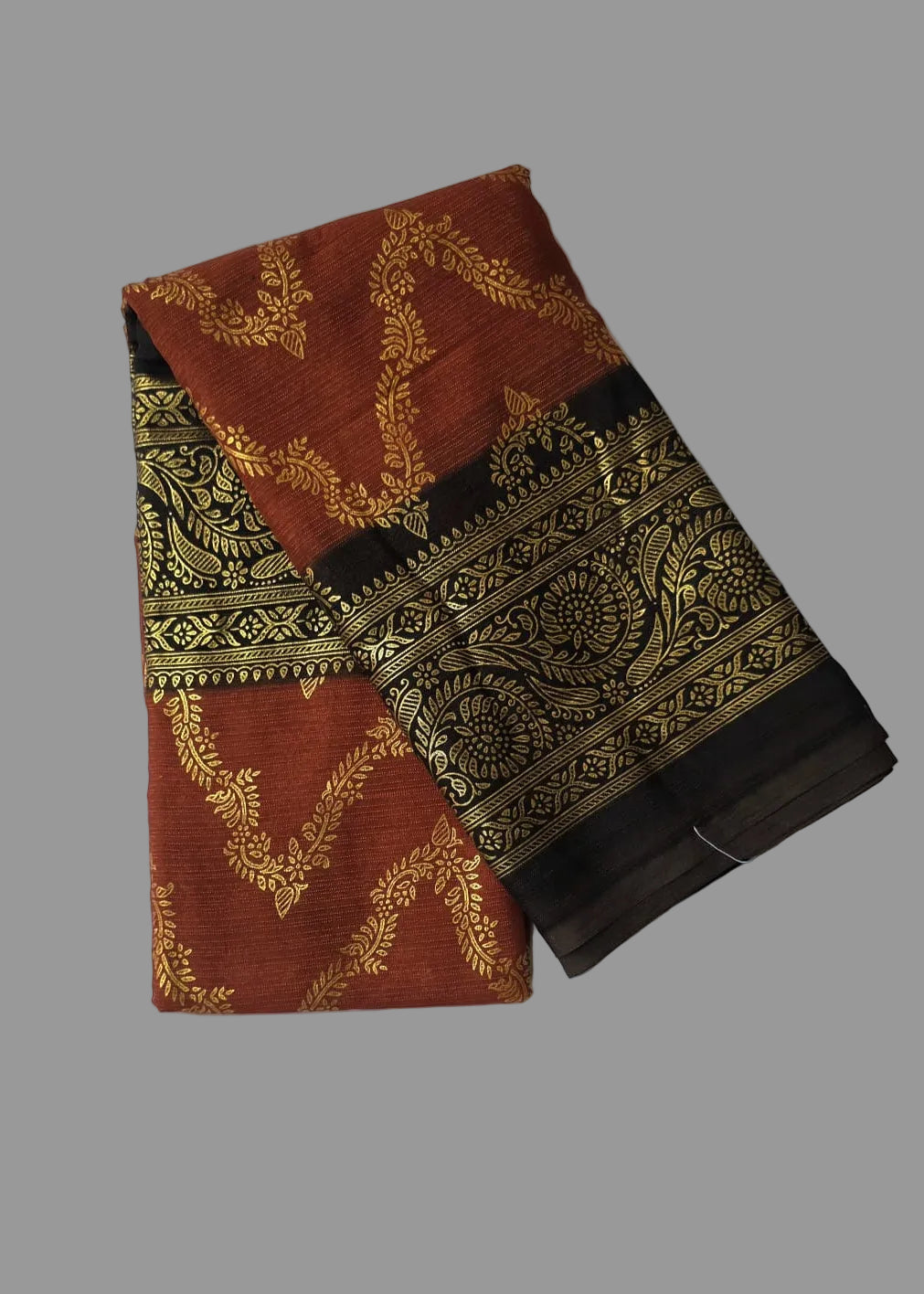 Rust orange colour with coffee brown border fiil printed saree