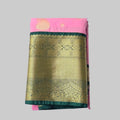 Light pink color with butta semi kanchipuram silk saree with dark green border