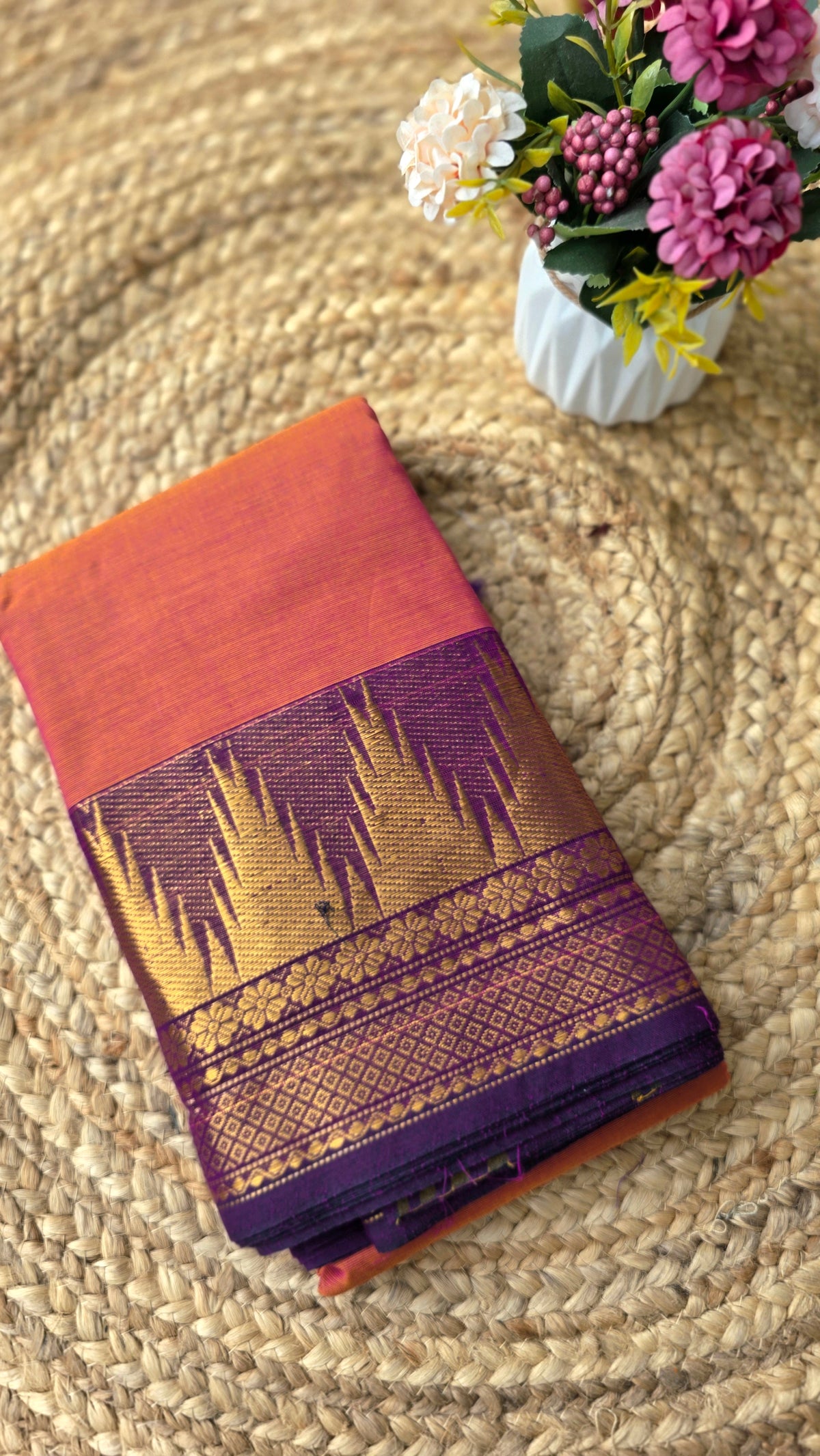 Orange colour kanchi cotton saree with dark violet border