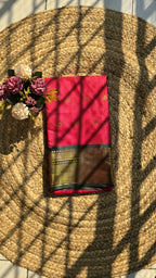 Rani pink colour semi silk saree with dark green border