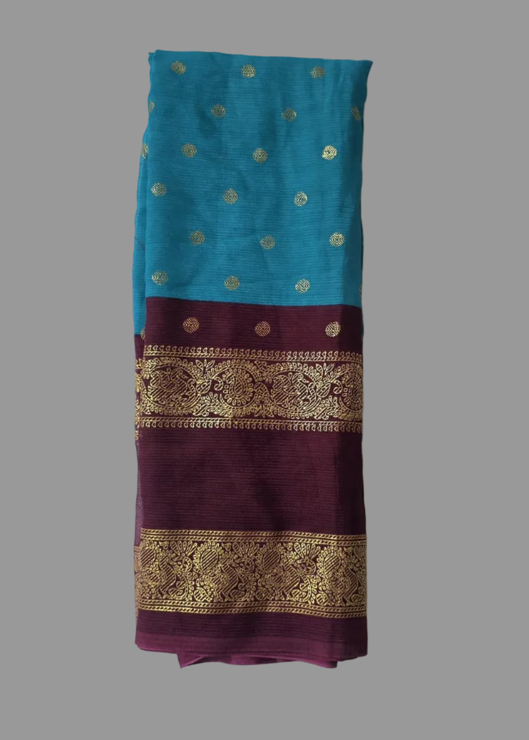 Blue colour foil printed saree with coffee colour border with buttas