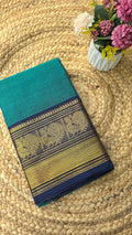 Sea green kanchi cotton saree with navy blue border