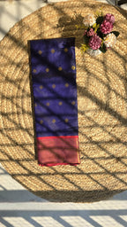 Navy blue semi kanchipuram silk saree with red border