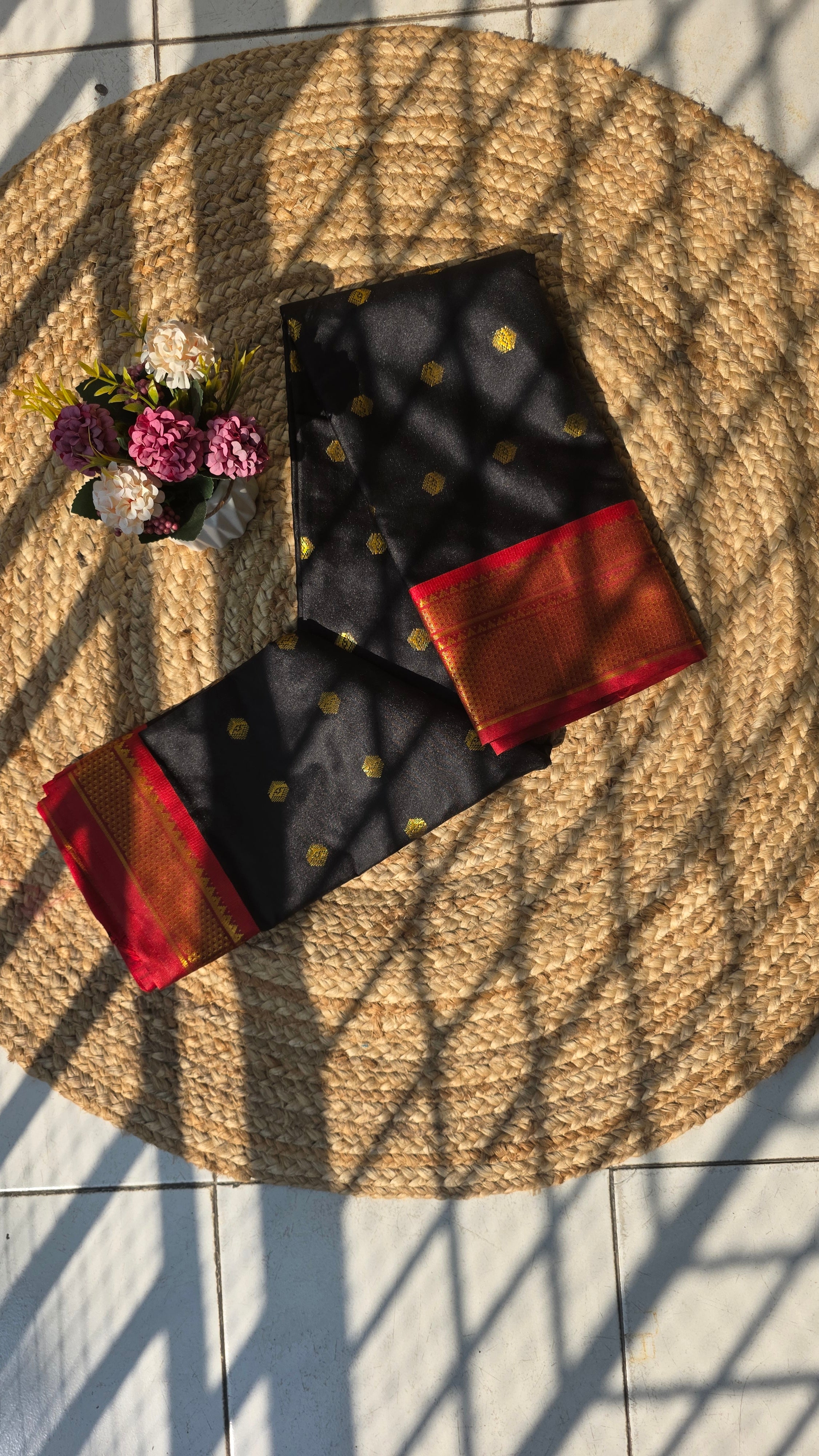 Black colour semi silk saree with red border