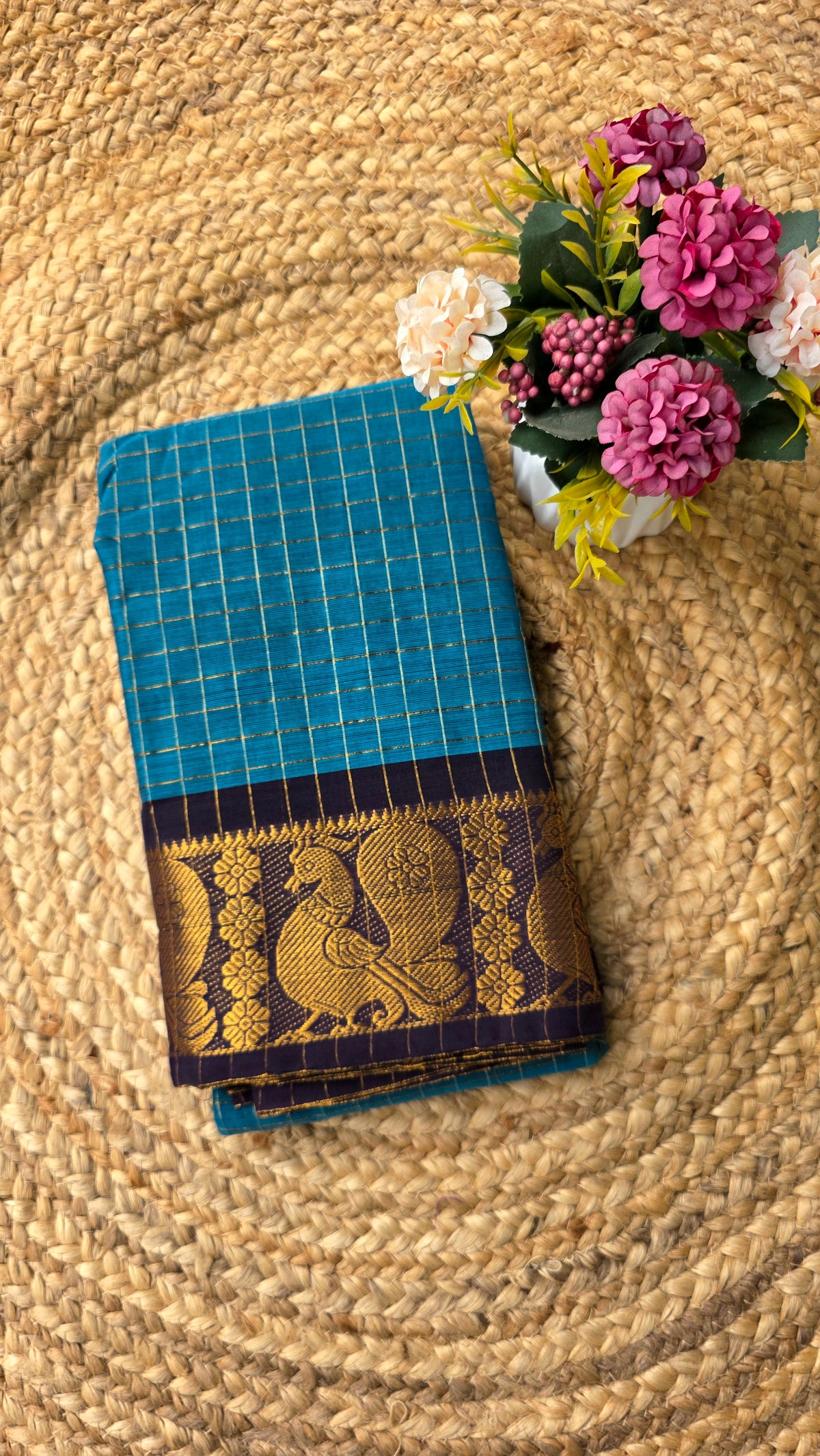 Blue check kanchi cotton saree with black border