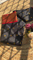 Black colour semi silk saree with red border